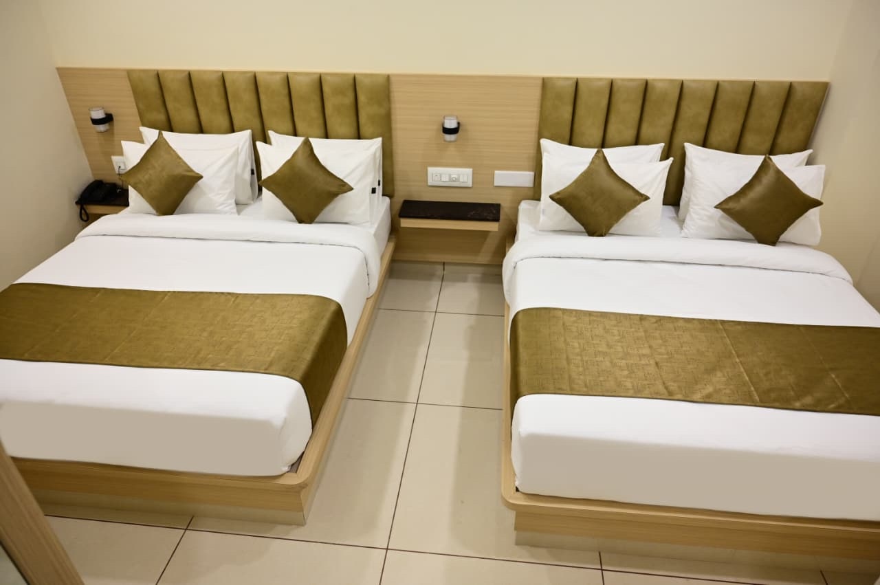 Premium Family Standard room at SR Grand Hotel Tumkur — well-furnished AC room for families