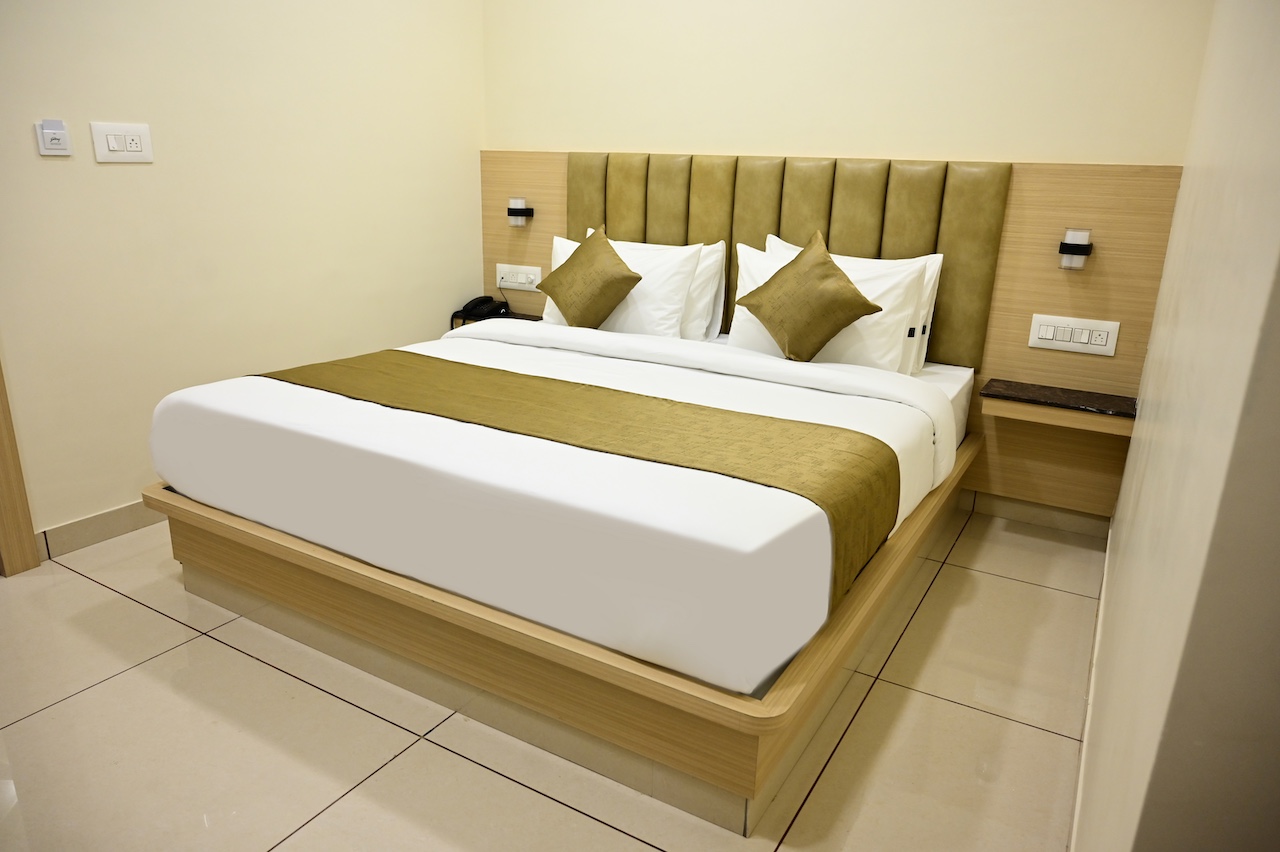 Premium Standard room at SR Grand Hotel Tumkur — affordable single AC room with WiFi at ₹2,000/night